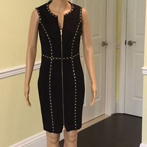 Body perfecting faux leather trim sheath dress